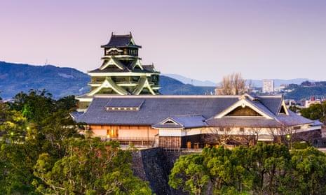 Kumamoto Castle against pink sky