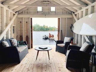 Image may contain Building Furniture Chair Shelter Countryside Rural Outdoors Nature Housing Wood and Couch