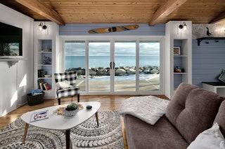Image may contain Furniture Table Coffee Table Indoors Couch Housing Building Rug Room and Living Room