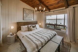 Image may contain Interior Design Indoors Furniture Bed Room Bedroom Wood Housing Building and Hardwood